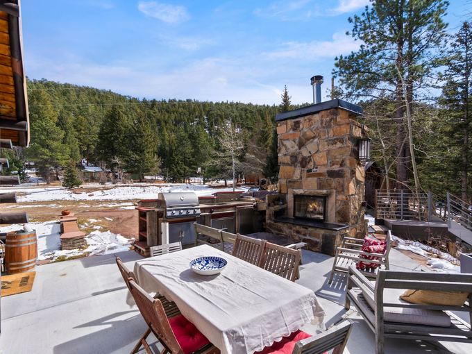 The stacked-stone outdoor fireplace terrace